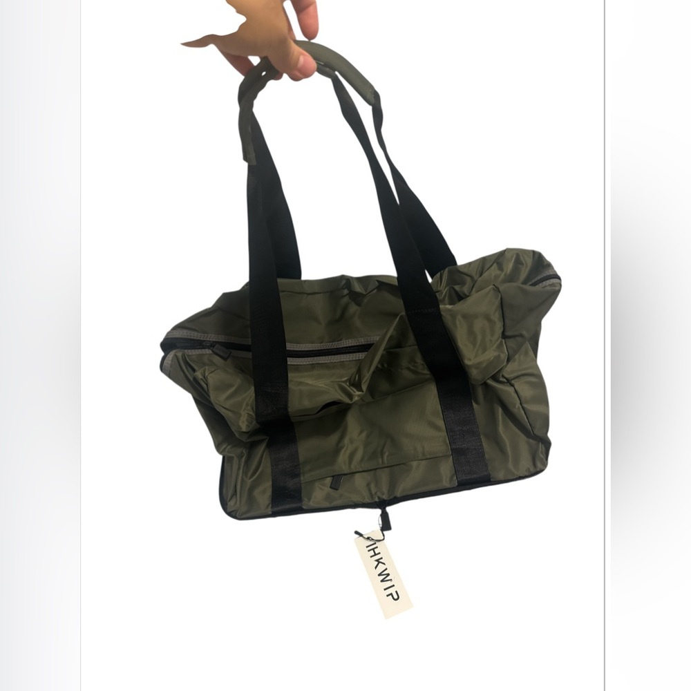 Green and Black Duffel Bag with Rugged Design